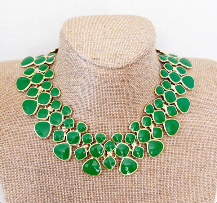 Green enamel and gold metal tone statement necklace.