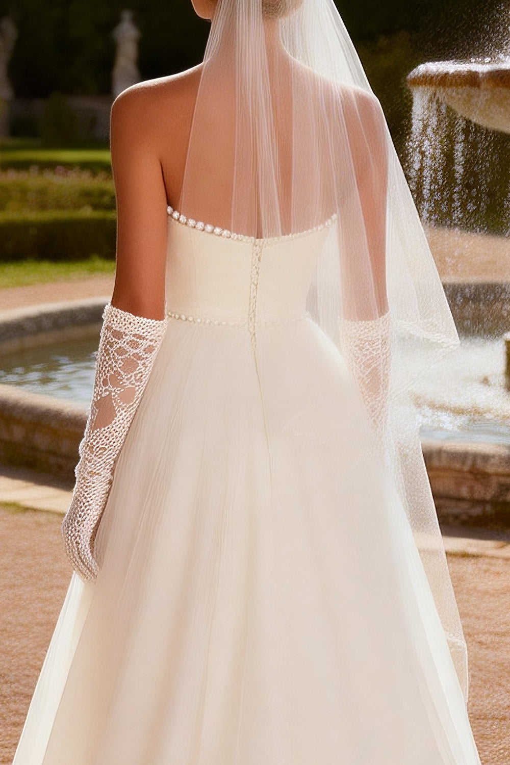 Ivory Tulle Strapless A Line Beaded Sweep Train Wedding Dress