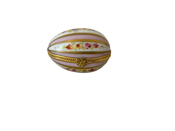 This item is a Dubarry Limoges porcelain egg-shaped trinket box