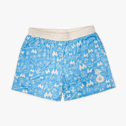 Youth model wearing youth shorts with “Grand Slam Collector” design
