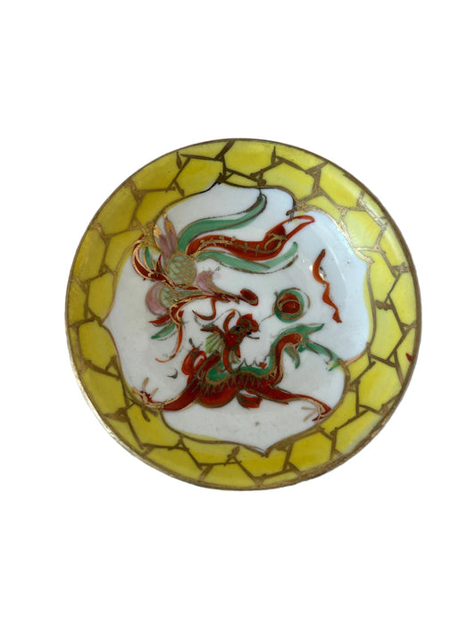 This vintage Chinoiserie saucer